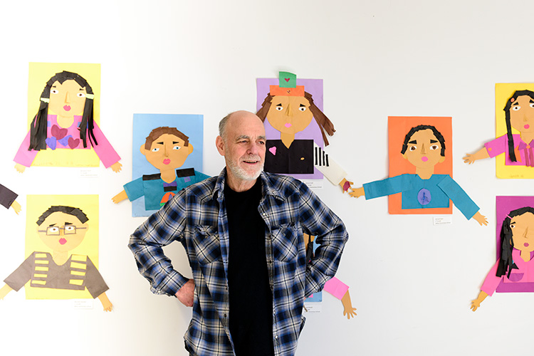 Dan Gumina with collage portraits.
